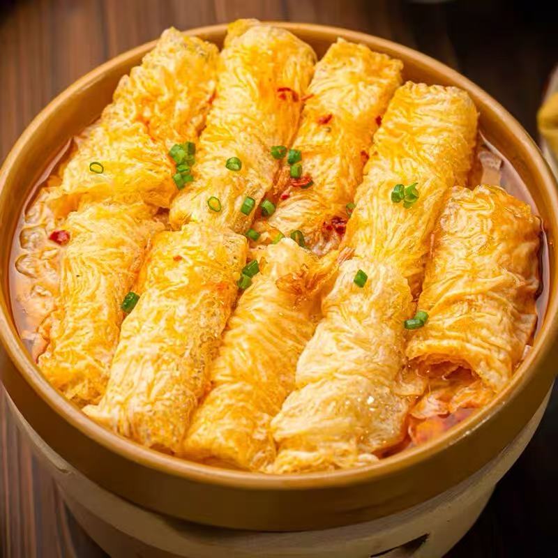 Fried tofu skin rolls in soup